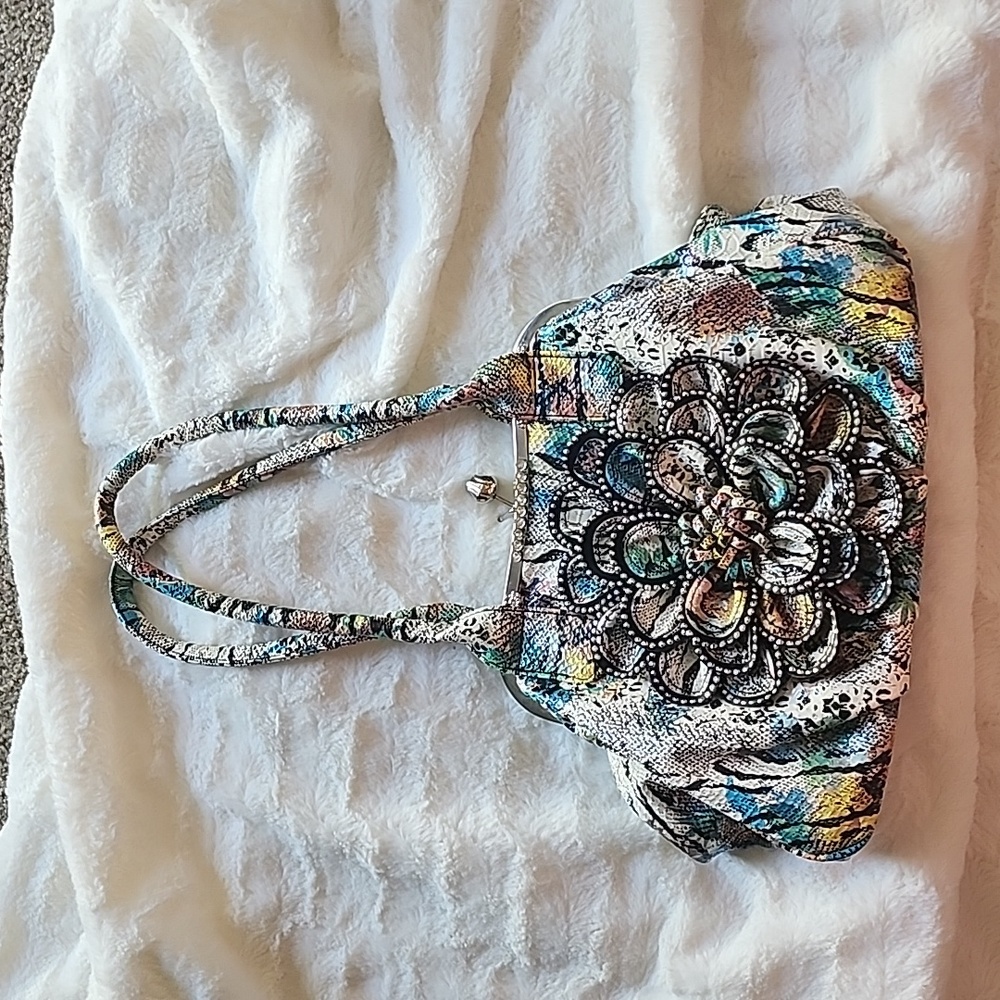 Multi colored purse with big flower and bling